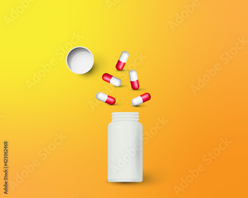 Bottle and scattered pills on color background.