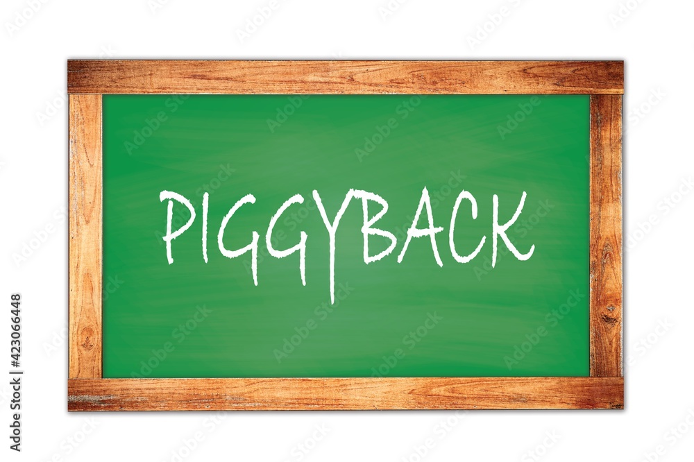 PIGGYBACK text written on green school board.