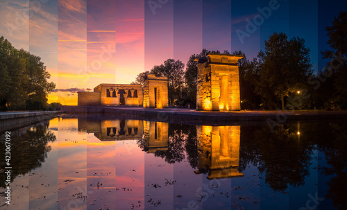 Old Egyptian shrine reflecting in pure water under bright sky at sundown in Madrid Spain photo