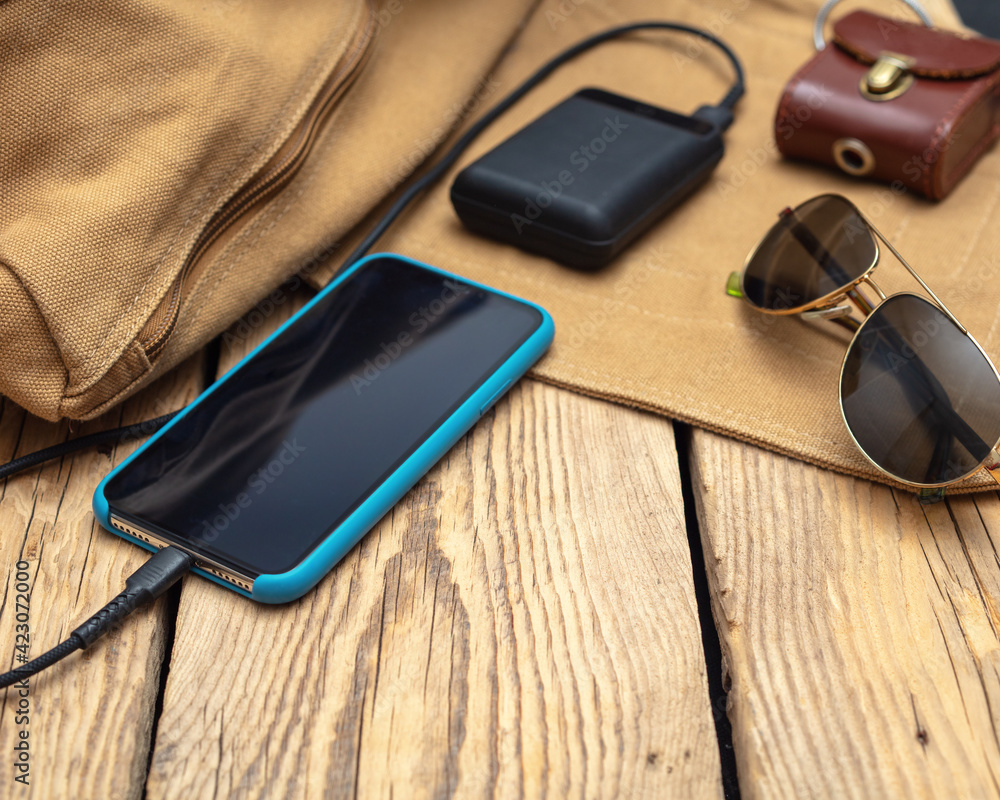 Charging the empty battery smartphone with power bank. Charging the empty battery smartphone with power bank.