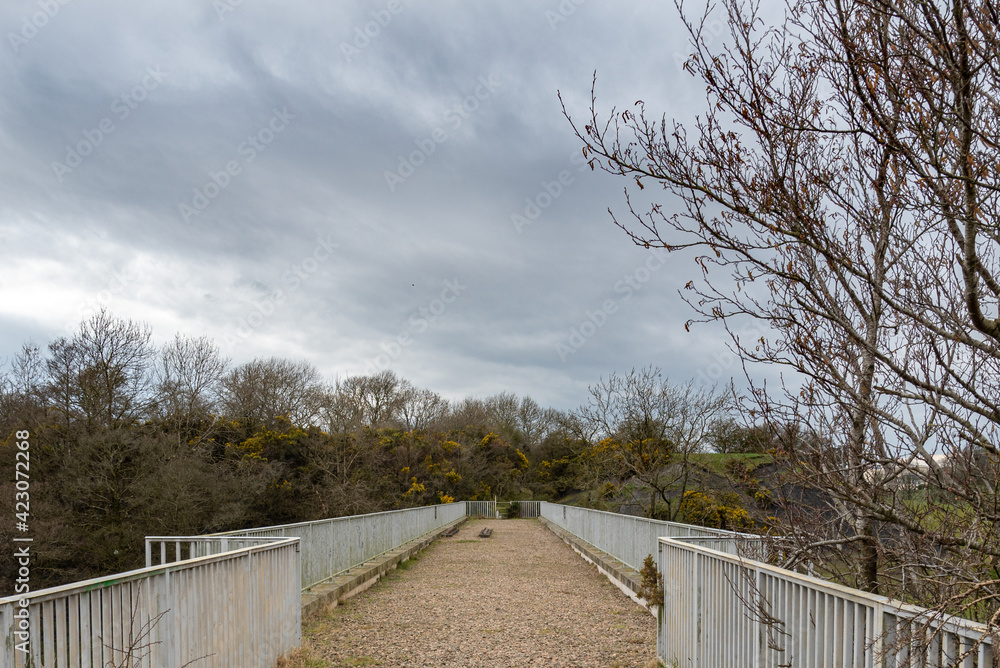 Fototapeta premium The Top or walkway on Laigh Milton Viaduct which is thought to be one of Scotlands oldest railway viaducts.