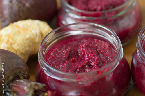 Bowl of homemade Red Chrain, a spicy paste made of grated Horseradish (Armoracia rusticana, syn. Cochlearia armoracia) and Beetroot, a traditional food of the Jewish Passover holiday