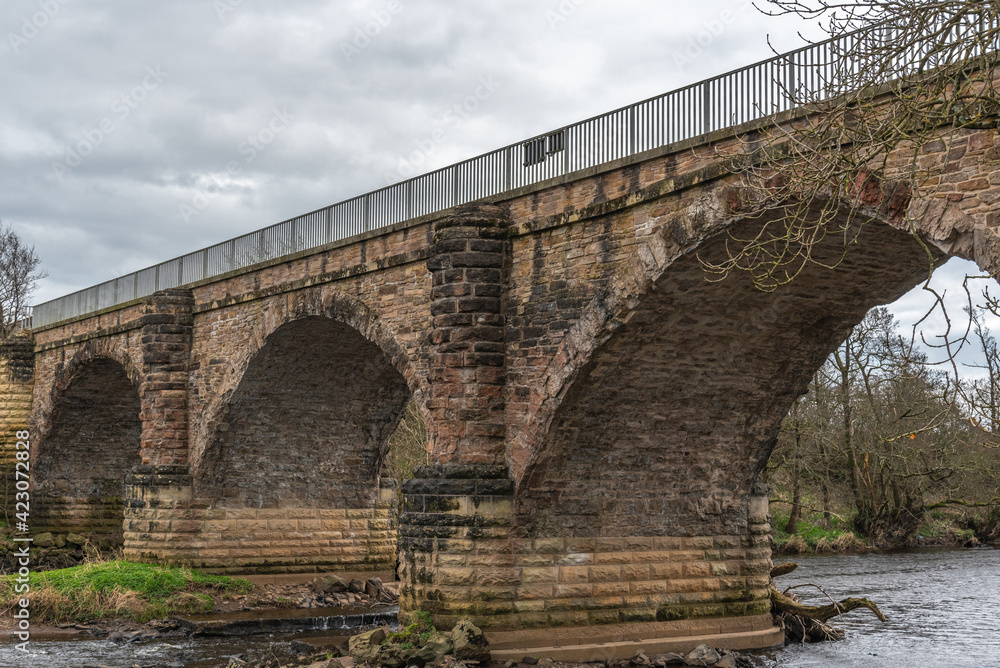 Fototapeta premium The Tripple Archways and Suppoprts of Laigh Milton Viaduct which is thought to be one of Scotlands oldest railway viaducts.