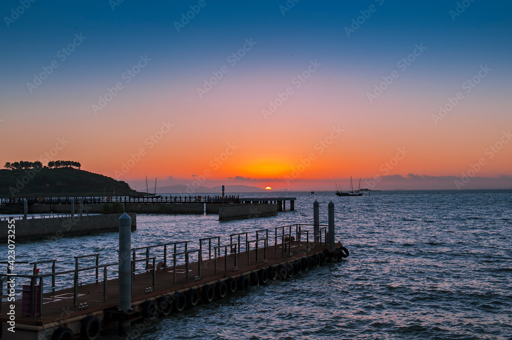 sunset over the pier sunset over the pier