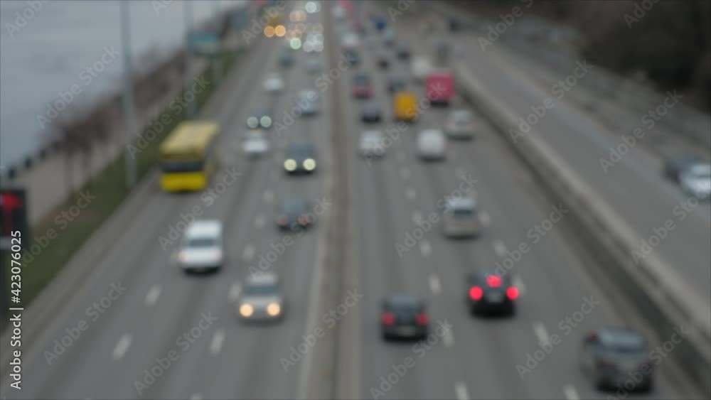 Blurry of vehicles with speed on the highway. Huge car traffic on the city highway Blurry of vehicles with speed on the highway. Huge car traffic on the city highway