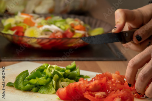 Sliced green pepper and tomato