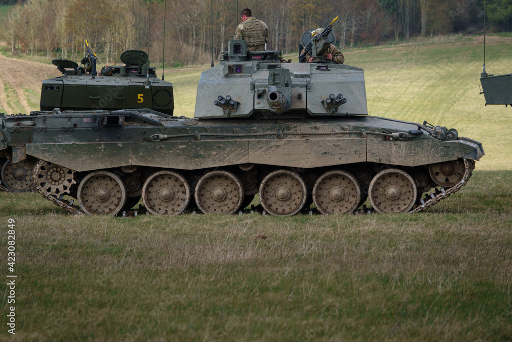 the crew of four from a british army Challenger II 2 FV4034 main battle tank take a well earned break from a military exercise, Wiltshire the crew of four from a british army Challenger II 2 FV4034 main battle tank take a well earned break from a military exercise, Wiltshire