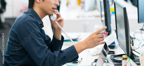 Photos ビジネス・電話・男性