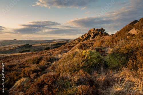 Winter sunset panoramic view of Baldstone, and Gib Torr in the Peak District National Park.