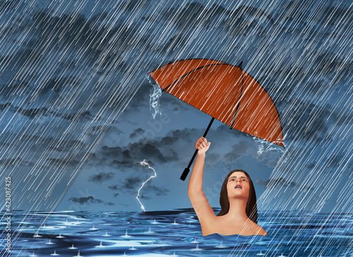 In an act of futility, a woman in a lake or ocean is in a rainstorm but despite being wet already, holds an umbrella overhead for protection from the rain in this 3-D illustration. photo