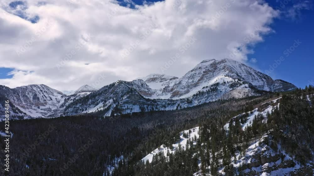 Aerial view over the Utah wilderness in winter viewing Timpanogos Mountain. Aerial view over the Utah wilderness in winter viewing Timpanogos Mountain.