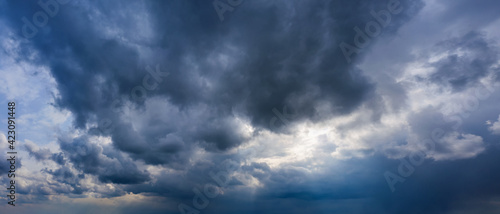 Stormy sky with dark rainy clouds. Weather forecast concept.