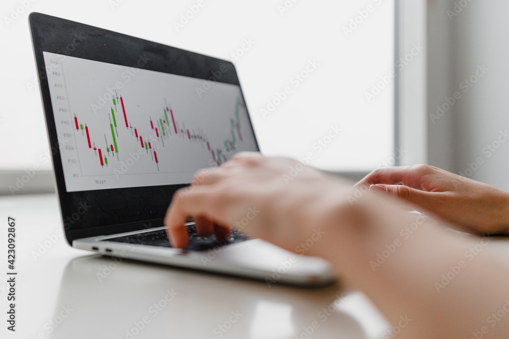 Woman working at home office hand on keyboard close up Woman working at home office hand on keyboard close up