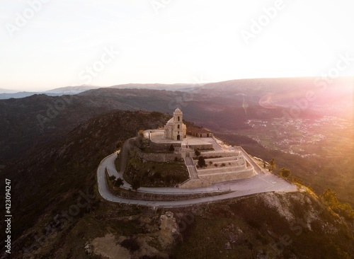 Aerial sunrise panorama of mountain hill top church chapel Sanctuary Nossa Senhora da Granca in Mondim de Basto Portugal photo