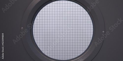 porthole window with black frame and translucent glass reinforce