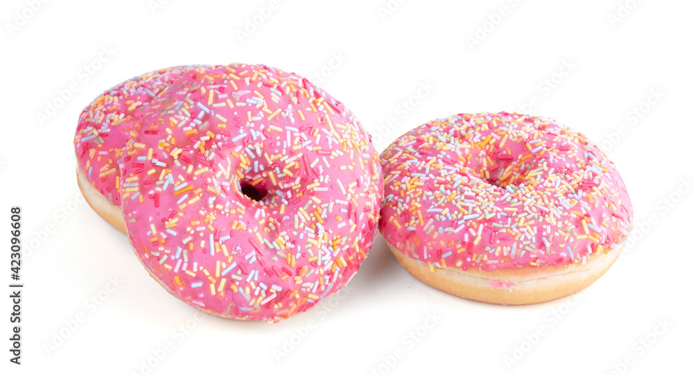 Three pink donuts with small candies Three pink donuts with small candies