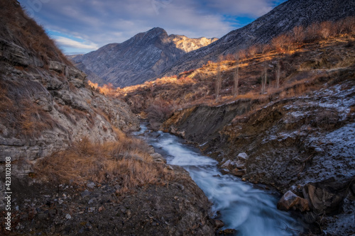 Tortum creek near the waterfall in wintertime in Uzundere, Erzurum, Turkey. January 2021