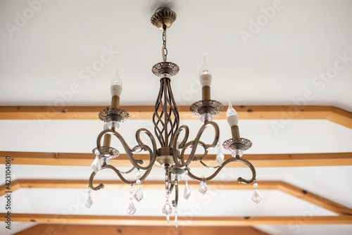 Crystal chandelier in vintage style. White background.