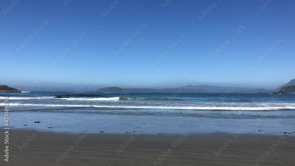 Waves of Pacific Ocean hitting shores near Pacific Rim National Park Reserve - popular surfing destination located between Tofino and Ucluelet on the west side of Vancouver Island Waves of Pacific Ocean hitting shores near Pacific Rim National Park Reserve - popular surfing destination located between Tofino and Ucluelet on the west side of Vancouver Island