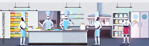 modern robots chefs cooking dishes robotic cooks preparing food artificial intelligence technology culinary concept modern kitchen interior horizontal full length