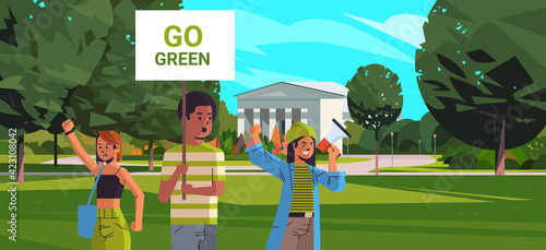 environmentatrike concept mix race protesters campaigning to protect earth demonstrating against global warming portrait university campus horizontal