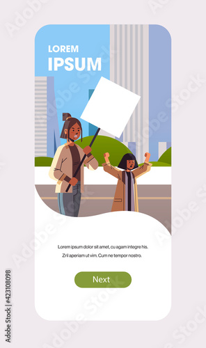 activists protesting holding placard with female gender sign feminist demonstration girl power movement rights protection women empowerment concept portrait mobile app vertical copy space