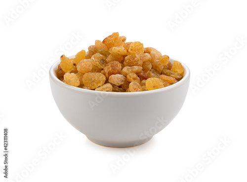 bowl of raisins isolated on background.