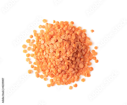 Heap of raw red lentils isolated on white background.Top view