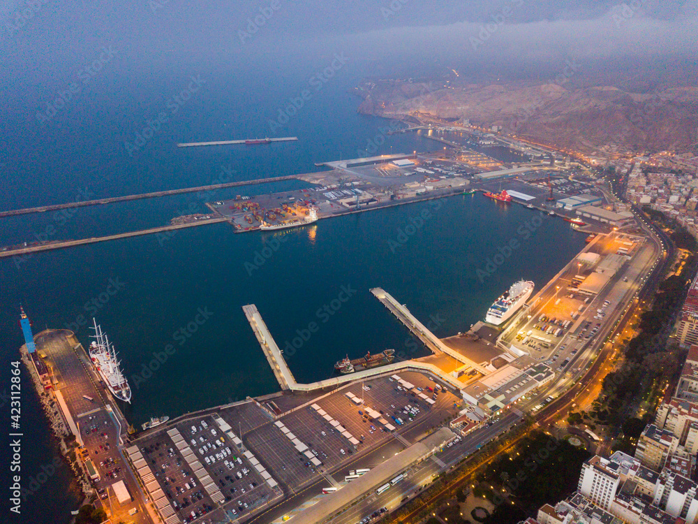 Obraz premium Aerial view of old town and port in Almeria city with of sailboats and yachts