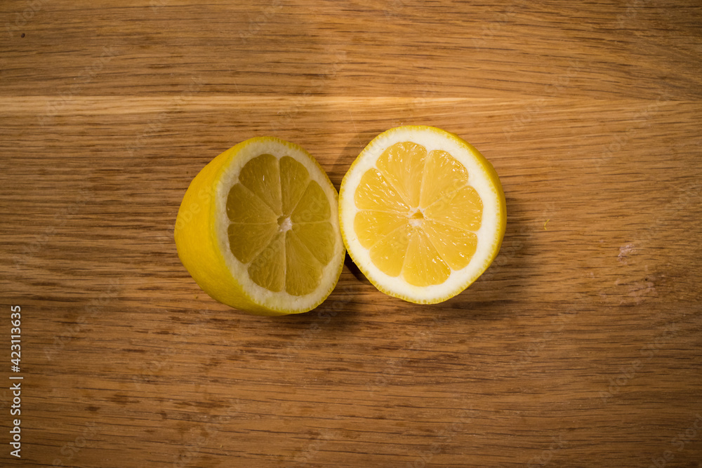 Sliced lemon slices on a wooden table - food photography Sliced lemon slices on a wooden table - food photography
