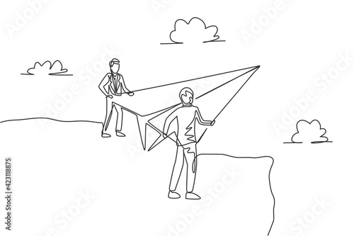 Single one line drawing young businessmen standing on top mountain and holding paper airplane to fly. Business metaphor concept. Modern continuous line draw. Minimal design graphic vector illustration