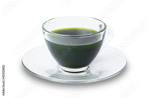 Green vegetable smoothie juice in cup glass isolated on white background. Clipping path.
