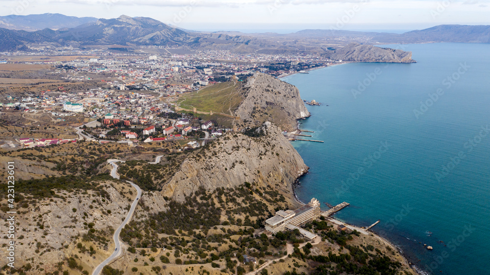 Coast of the Crimea peninsula, rocky mountains, aerial view of the sea resort Sudak,