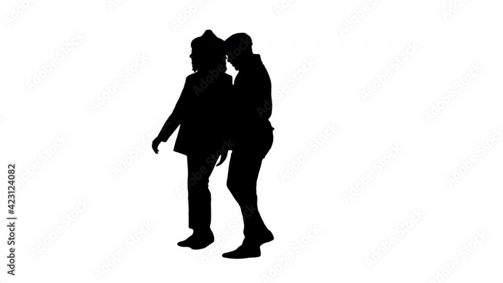Silhouette Happy African American couple walking and taking a selfie. Silhouette Happy African American couple walking and taking a selfie.