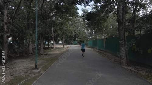 Wallpaper Mural man running in the park Torontodigital.ca