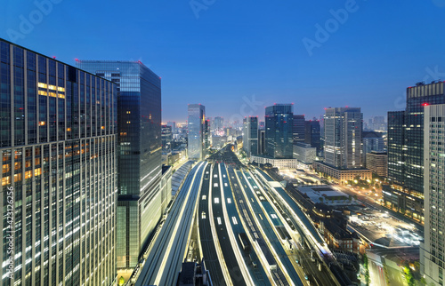 Photography Scenery of Tokyo Train Station before dawn, with a high angle view of railway pl