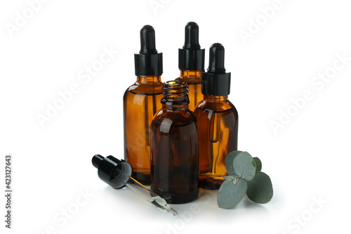 Eucalyptus essential oil in dropper bottles isolated on white background