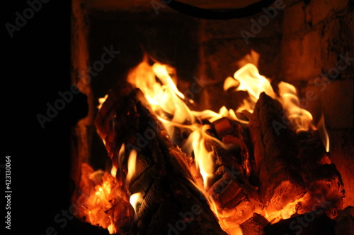 Burning Fire Wood and Coals in Fireplace Chimney