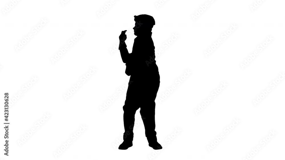 Silhouette Happy stylish boy doing some cool dancing. Silhouette Happy stylish boy doing some cool dancing.