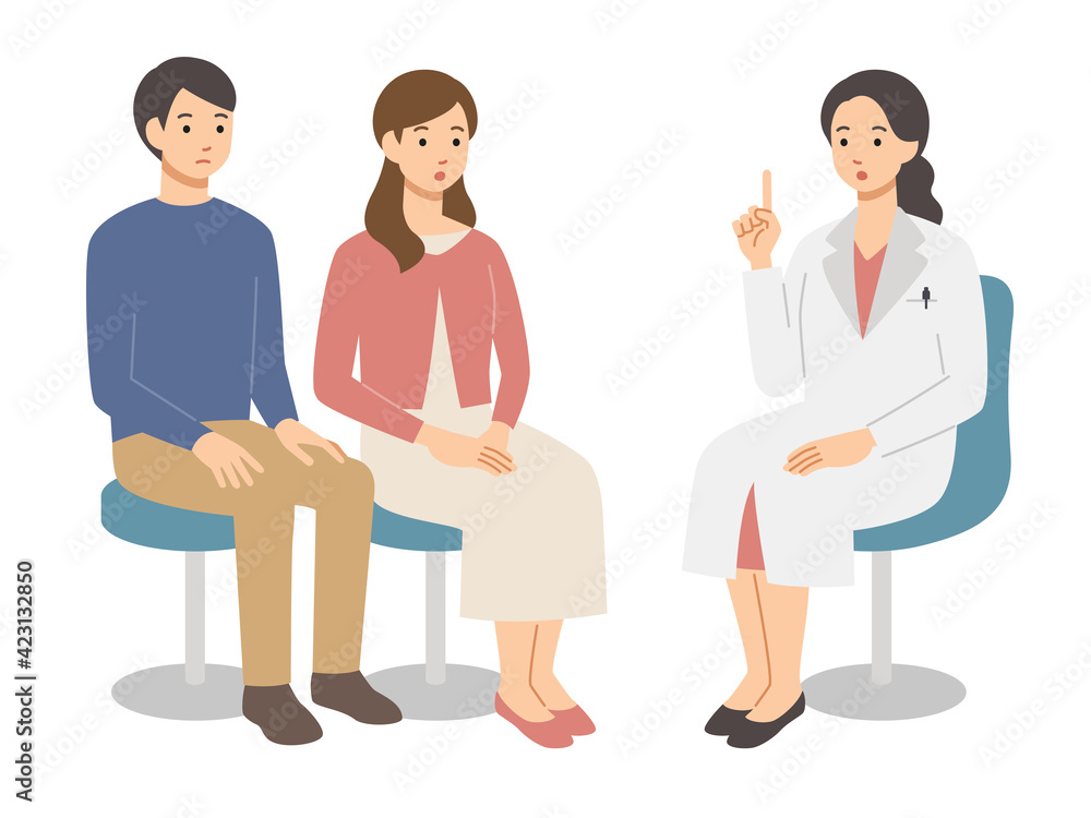 若い夫婦と診察する女性医師 若い夫婦と診察する女性医師
