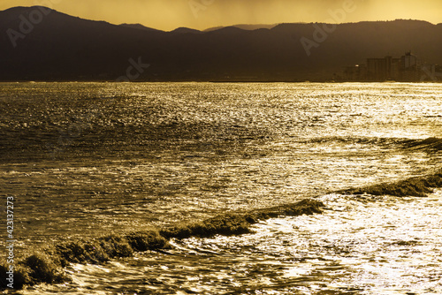 Sunset landscape on coast in Spain photo