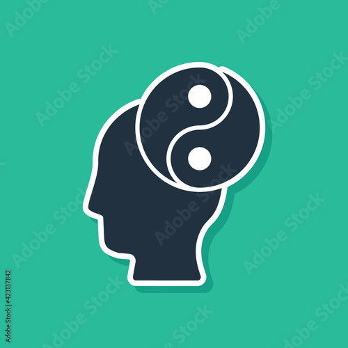 Blue Yin Yang symbol of harmony and balance icon isolated on green background. Vector