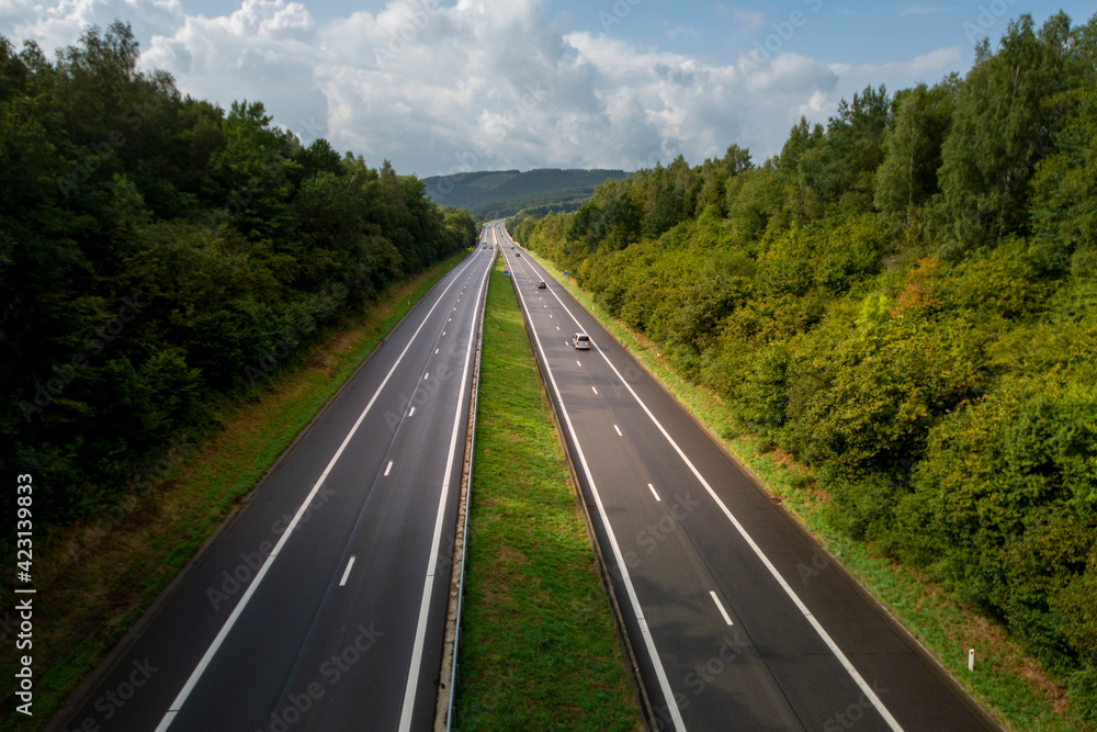 Fototapeta premium Highway in the Belgian Ardennes. Vertical layout
