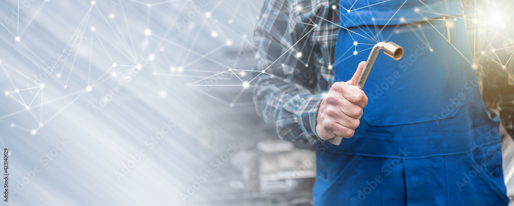 Car mechanic with car engine on background; panoramic banner Car mechanic with car engine on background; panoramic banner