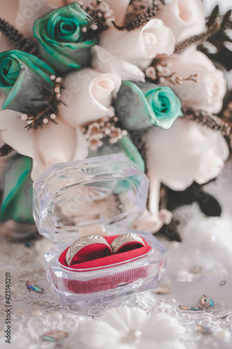 Fototapeta Naklejka Na Ścianę i Meble -  Bridal bouquet with rings, earrings, accessories and shoes, wedding concept