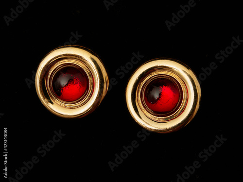 Принти на полотні Golden vintage earrings from the eighties with gems inlaid on them