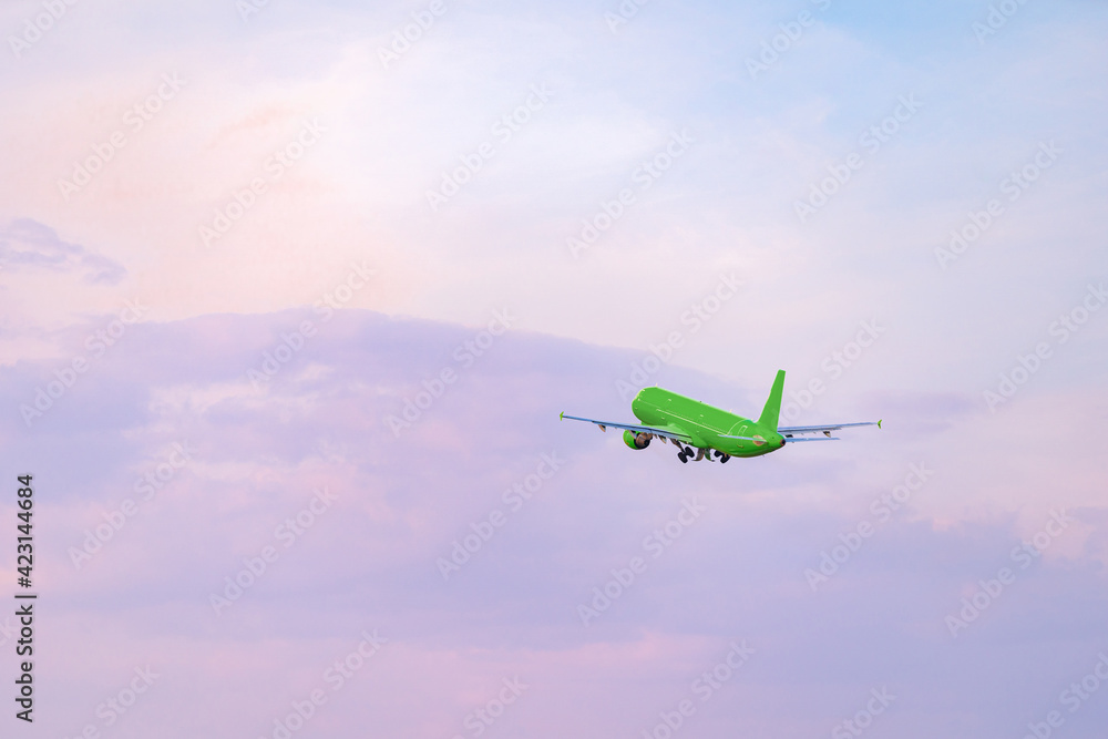 Passenger airplane flying against clear blue sky Passenger airplane flying against clear blue sky
