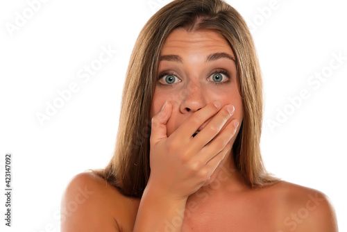 shocked young woman with blue eyes