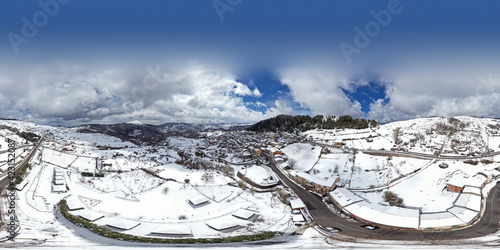 Wallpaper Mural 360 degree aerial shot with drone of the small town of Floresta, the highest town in Sicily, in the heart of the Nebrodi. Winter in Floresta. Snow in Sicily. View of the snow-covered Etna. Torontodigital.ca