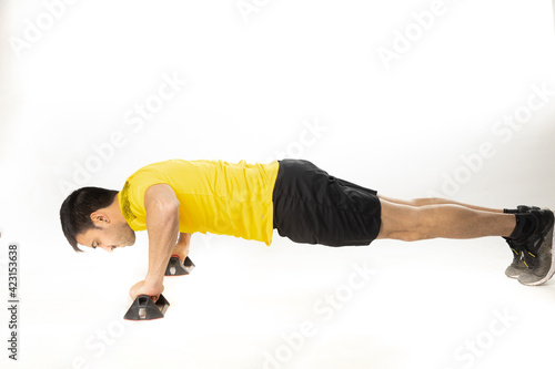 man doing push-ups exercise on white background